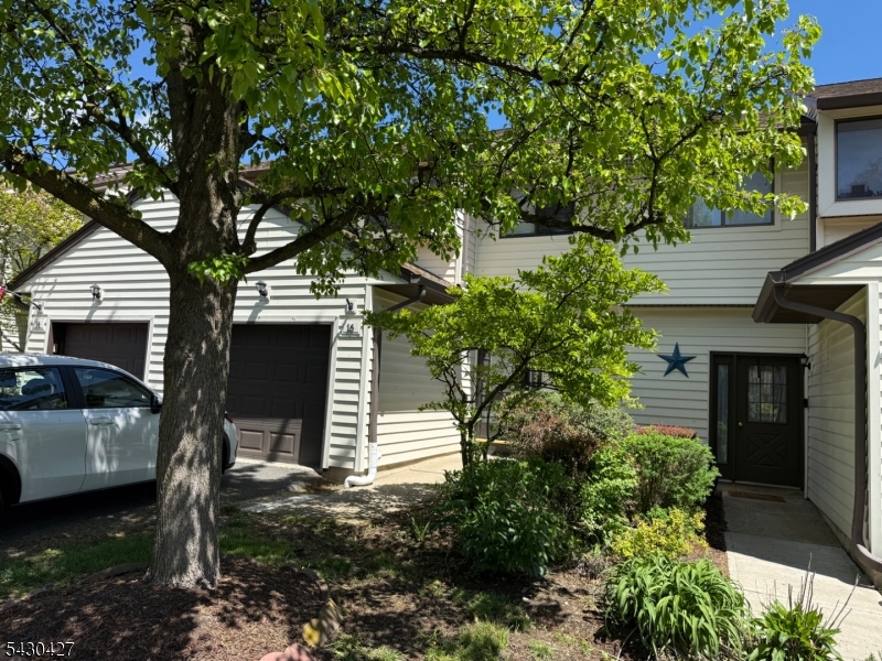 STEP INTO THIS ENCHANTING 3-LEVEL, 2-BEDROOM TOWNHOME WITH A FINISHED BASEMENT, TUCKED WITHIN A CHARMING COMMUNITY OFFERING WONDERFUL AMENITIES AND EVERYDAY CONVENIENCE. FROM THE MOMENT YOU ENTER, YOU'LL APPRECIATE THE WARMTH, COMFORT, AND CHARACTER THROUGHOUT. THE BEAUTIFULLY RENOVATED KITCHEN FEATURES STAINLESS STEEL APPLIANCES, A STYLISH TILED BACKSPLASH, AND ELEGANT GRANITE COUNTERTOPS, CREATING AN INVITING SPACE TO COOK, GATHER, AND ENTERTAIN. THE SPACIOUS LIVING ROOM IMPRESSES WITH A SOARING VAULTED CEILING AND A COZY WOOD-BURNING FIREPLACE, PERFECT FOR RELAXING EVENINGS OR WELCOMING GUESTS. A SEPARATE DINING AREA SITS CONVENIENTLY NEAR THE KITCHEN, MAKING BOTH DAILY MEALS AND SPECIAL OCCASIONS EASY TO ENJOY. UPSTAIRS, THE INVITING PRIMARY BEDROOM OFFERS A GENEROUS WALK-IN CLOSET AND PRIVATE ACCESS TO THE MAIN BATHROOM, WHILE THE SECOND BEDROOM PROVIDES EXCELLENT FLEXIBILITY FOR GUESTS, A HOME OFFICE, OR A PEACEFUL RETREAT. THE FINISHED BASEMENT ADDS VALUABLE LIVING SPACE AND INCLUDES A UTILITY ROOM, LAUNDRY AREA, AND ADDITIONAL STORAGE, GIVING YOU ROOM TO SPREAD OUT WHILE STAYING ORGANIZED. A RECENTLY REPLACED HVAC SYSTEM PROVIDES ADDED PEACE OF MIND. OUTSIDE, ENJOY ACCESS TO AN CLUB HOUSE, IN-GROUND POOL, TENNIS COURTS, PICKLE BALL, BASKETBALL COURTS, AND A PLAYGROUND. ALL WITHIN A DELIGHTFUL NEIGHBORHOOD SETTING. IDEALLY LOCATED NEAR SHOPPING, MAJOR ROUTES, DINING, AND EVERYDAY CONVENIENCES, THIS HOME OFFERS THE PERFECT BLEND OF CHARM, FUNCTION, AND LOCATION.