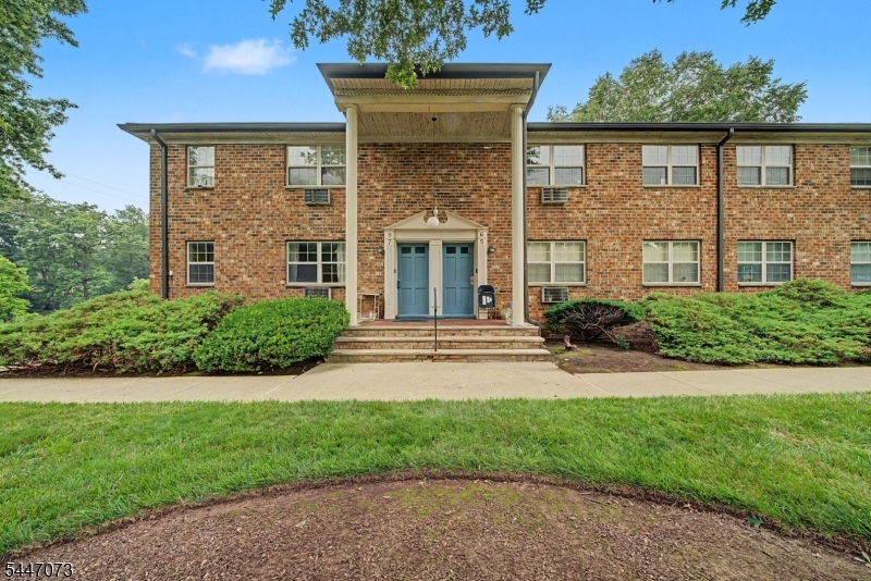 Welcome to this beautifully updated first-floor unit where classic brick architecture meets a fresh, modern interior. Step inside to find rich hardwood floors flowing through a sun-filled living room and adjoining dining area, both finished with recessed lighting and crisp neutral paint. The updated galley kitchen delivers granite counters, white shaker cabinetry, a stylish tiled backsplash, stainless microwave, gas range, and easy-care tile flooring. The spacious primary bedroom offers dual windows, a ceiling fan, and generous closet space, while the remodeled full bath features a subway-tiled tub surround, marble-look tile flooring, a modern vanity, and contemporary lighting. Additional highlights include baseboard hot water heat, a private entry setting, and an unbeatable Denville Township location just off Route 46 with quick access to shopping, dining, transportation, and major highways. A polished, low-maintenance offering with nothing left to do but unpack.