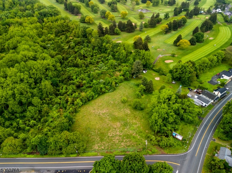 Prime opportunity to own 1.77 acres of commercially zoned land in scenic Harmony Township. Located at the corner of Harmony Brass Castle Road and Belvidere Road, this property offers approximately 200 feet of road frontage in a peaceful yet accessible setting. Zoned CO-1 (Commercial/Office/Business Zone " One), the lot allows for a broad mix of uses including agricultural operations and single-family dwellings used in connection with a farm, making it ideal for those seeking a blend of rural lifestyle and business opportunity.Also permitted are a variety of commercial uses such as retail (grocery, hardware, pharmacy, dining), personal service businesses (salons, tailors, repair shops), professional and medical offices, banks, funeral homes, office buildings, and research labs. Medical clinics, nursing homes, and municipal/nonprofit uses are also allowed. Accessory uses include garages for business vehicles, rooftop or screened ground-mounted solar systems, and preexisting residential units located within a commercial building. Conditional uses subject to site plan review include houses of worship, clubs, schools, and service stations. With generous zoning flexibility, road visibility, and a setting that blends small-town charm with commercial viability, this property is ideal for farm-based businesses, local services, or professional expansion. Whether you're investing, developing, or growing something of your own this lot offers room to thrive. Survey Available.