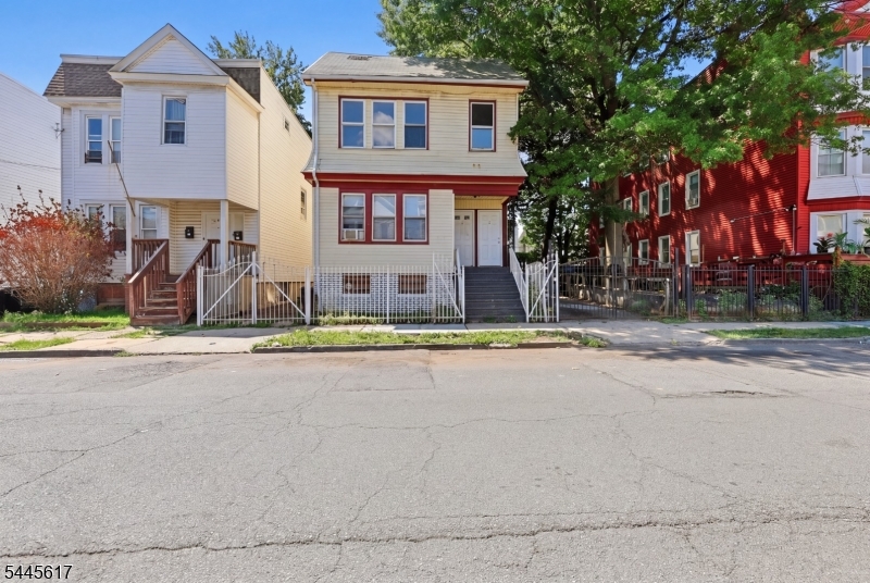 Welcome to 191 21st St, Irvington, NJ 2-Family Home  A Must See! Don't miss this well-maintained 2-family home, perfect for owner-occupy or investment. The vacant 2nd floor unit is a spacious 4-bedroom, 1-bath with a large kitchen, separate dining room, and great natural light, nicely renovated with new flooring throughout, freshly painted, and includes a window AC unit move-in ready for the new owner. The 1st floor is a 3-bedroom, 1-bath unit with kitchen and dining room, occupied by a great long-term tenant and kept in very good condition, offering stable income from day one. The home also features a full unfinished basement with high ceilings that can easily be converted into livable space, plus a private driveway and garage for off-street parking. Whether you're looking to live in one unit and rent the other or add a cash-flowing property to your portfolio, 191 21st St has the space and upside you want. Schedule your private showing today this one won"t last!