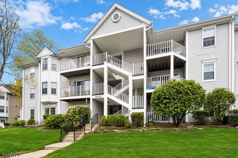 Welcome to this stunning 2-bed, 2-bath top-floor condo in Mahwah?s sought-after Society Hill! Offering 1,108 sqft of beautiful living space, this bright home features spectacular vaulted ceilings for an expansive feel. The open kitchen is a dream with sleek SS appliances, ample cabinetry, and a breakfast bar flowing seamlessly into the living area. Gather around the cozy wood-burning fireplace on chilly evenings, or step out onto your spacious private balcony to enjoy serene views.Retreat to the primary suite, boasting a walk-in closet and a beautifully updated ensuite bath. A spacious second bedroom offers great versatility, perfectly complemented by a thoughtfully updated second full bath. You will also enjoy the fantastic convenience of 1 assigned parking space.Society Hill offers resort-style amenities right at your doorstep, including a sparkling outdoor pool, tennis courts, and a community room. Beyond the neighborhood, Mahwah delivers a spectacular lifestyle! Enjoy close proximity to hiking at Ramapo Valley County Reservation, skiing at Campgaw Mountain, plus excellent nearby shopping and dining. Commuters will love the easy access to major highways and the Ramsey RT 17 train station for a seamless trip to NYC. Experience the pinnacle of low-maintenance, sophisticated living!