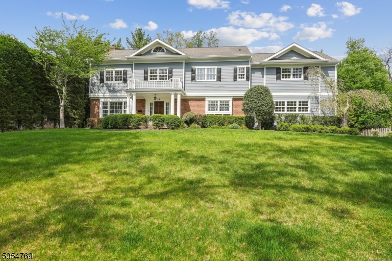 ABSOLUTELY PERFECT! Grand, renovated to perfection every amenity - Meticulously maintained 5 Bed, 3.5 Bath Center Hall Colonial on .53 Acres of totally level, professionally landscaped private grounds. Ideally located on quiet street walking distance to Pingry School & Gero Park & bus service to highly rated Hartshorn Elementary School. Hardwood floors & Sonos speakers throughout, Stunning kitchen w/ custom cabinetry, center island, high end Subzero refrigerator/freezer, Miele Dishwasher, Miele oven, Thermador range & Miele microwave. Totally open to Family Room w/ vaulted ceilings, painted brick gas FP & Surround sound speakers for home theatre, flat screen is included. Easy access to summer outdoor kitchen & grill w/ 2 level Bluestone Patio framing in-ground heated pool + enchanting gazebo, shed & swing set. Formal Living room w/ marble gas FP. Dining room features custom built-in storage w/ marble top. Luxurious Primary suite w/ Palladium window, massive walk-in custom closet, new spa-like bath with radiant heated floor, electric fireplace, soaking tub, shower, plus 4 more bedrooms share 2 more new baths + laundry, and walk-up attic can be easily finished for additional space. Beautifully finished lower level with Recreation room & Exercise room, has every amenity Smart House features. All new thermal windows & doors throughout, Recirculated Hot Water, Reverse osmosis water filtration, whole house generator & heated garage, pre wired for EV Charger, new hot water heater.