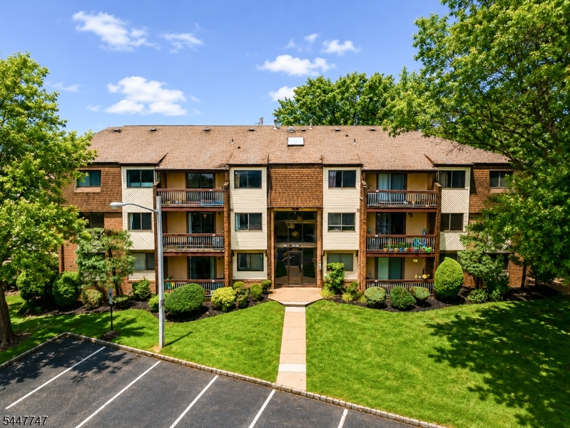 Welcome home to this beautiful, ground-floor end-unit townhome in the highly sought-after Edison Glen community! Boasting 2 spacious bedrooms and 2 full bathrooms across 1,275 sq. ft. of bright, open living space, this move-in-ready unit is designed for easy modern living. The welcoming entry foyer flows seamlessly into a vast living area, featuring large sliding doors that open to a private balcony, perfect for relaxation or your morning coffee. The functional eat-in kitchen features ample counter space, crisp cabinetry, updated appliances, and a separate sunny dining area. Enjoy the ultimate convenience of an in-unit laundry/utility room and open/assigned parking just steps from your front door. Community amenities include a sparkling outdoor pool and tennis courts. Unbeatable location for commuters, minutes from the Edison Train Station, Metuchen downtown, and major highways including Route 1, I-287, and the NJ Turnpike. Exceptional local shopping, dining, and parks are all right around the corner. Turnkey and ready for its next owner!