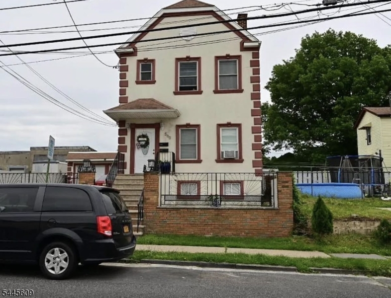 Bright and inviting 2-bedroom, 1-bath apartment offering approximately 950 sq ft of comfortable living space. Enjoy hardwood floors throughout, central A/C, a spacious kitchen with refrigerator and gas range, attic storage, and backyard access. Ideally located near shopping, dining, public transportation, parks, and major highways, with easy access to Newark, Jersey City, and NYC.  Parking available. No smoking. Move-in date: Aug 1.