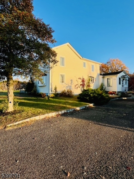 Fully updated Colonial on .6 acres . BRAND NEW SEPTIC SYSTEM. New hardwood floors. Main floor en-suite. Upstairs has 2 large bedrooms and a flex room. Fully renovated large bathroom.Sun filled large entry with sitting area, half bath and a large laundry room. Large main floor en-suite.A large sun filled kitchen with tons of cabinets. A large dining room and living room. All appliances included with sale, they are a year old. Full basement unfinished with bathroom for future renovation. Basement is a full walkout to a paved patio and beautiful backyard. Full decked barbecue and kitchen area. Plenty of green space with a fully functioning greenhouse with electric and water. A fire pit and separate patio for fun entertaining nights. Large driveway can accommodate up to 6 vehicles. Detached 2 car garage with separate heat / ac with a fully renovated loft, a workshop and storage. Well/Septic and fully electric home, with three heat pump systems for efficiency. Top of the line water purification system, new water heaters and electrical throughout house. Brand New Septic system is being installed and completed by 5/31/26. Patio will be reinstalled as well.   Amazing views with country living. Monroe Township school system. Located within Minutes of New Jersey Turnpike and shopping. Sale is Contingent upon relocation, Seller does have a purchase property under contract.