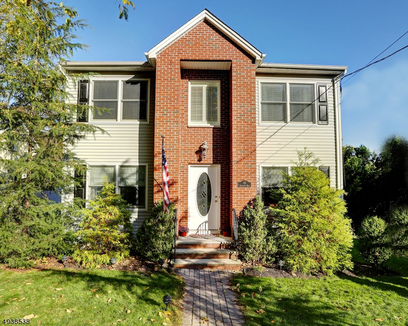 Unbelievable price! Hurry! Open high foyer! H/w floors DR, Kitchen has granite custom island, stainless appliances, living room, family room, and open kitchen concept! Sliding glass doors to newer Composite Deck, overlooking back yard! Second floor features master bedroom and bath plus 3 additional bedrooms and main bath. Finished walk out basement with high ceilings and sliding glass doors to patio area. Large back yard with privacy treed border. Upgrades include but not limited to custom island, granite counters, new kitchen appliances, 2 remodeled baths,  composite deck and stamped concrete patio. Great location within walking distance to train station, shopping, parks, etc. and access to highly-rated Parsippany school systems!