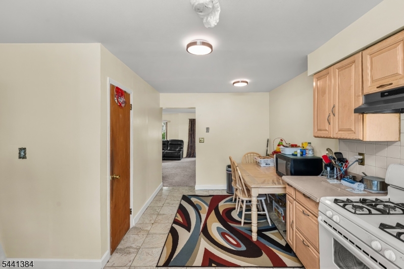 Location, Location, Location! This Hillsborough townhome is a perfect blend of Convenience, Comfort and Value: featuring a stone exterior, fresh paint (2026), updated Main Bathroom (2026) and a functional floor plan. The main level offers a welcoming foyer, ceramic tile flooring, a convenient powder room, and an eat-in kitchen with stainless steel appliances. The bright living room features large windows and direct access to a private deck, creating the perfect space for relaxing or entertaining.Upstairs, the spacious primary bedroom features two closets and abundant natural light. Two additional bedrooms offer flexible living options, including built-in storage and balcony access. The fully renovated (2026) 2nd-floor bathroom showcases a new shower, vanity, flooring, and light fixtures.The partially finished basement provides additional living space, along with a laundry/utility room. Updates include a newer HVAC system (2023) and water heater (2013).Conveniently located near shopping, dining, parks, and major commuter routes, this townhome is ideal for everyday living in the desirable Hillsborough Township.