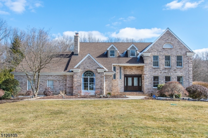 Forrest Hill colonial on large, open level lot with major improvements - updated granite and stainless kitchen, formal dining room, new 5 inch plank hickory wood flooring, new front door, refinished basement, updated master bath, freshly painted interior, staircase with custom railings, wood flooring, newly constructed composite deck, 2 year roof, newly paved driveway and paver walkway, new windows on sides and rear of home and more.  Grand two story great room with floor to ceiling brick wood-burning fireplace, 1st floor office with sliding glass doors to deck and adjacent 1/2 bath with room for conversion to full bath, 2nd floor unfinished 300sf space with unlimited potential, spacious bedrooms, primary en suite, as well as guest suite and 2 additional bedrooms.  Park-like backyard and Forrest Hill common area/pond with gazebo.  Chester Twp. schools and West Morris Mendham High School.  Nothing to do but unpack and love living here!