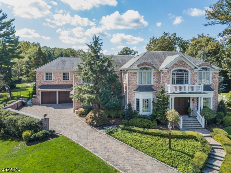 A Spectacular Smart Home--  Perfect for the buyer that wants absolutely everything! Located on 1.6 acres, heated/salt water pool, 4 heated garages, 6 plus bedrooms, 7.3 baths, huge level yard. Absolutely the most amazing home in Chatham. Features the finest features, design, technology, and location! This is the home for the most selective buyer who craves land, some privacy but still be located in Chatham with top ranks schools and easy - direct commute into Penn Station.