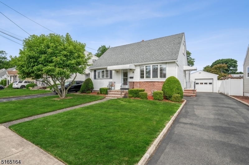 Move-in ready, private back yard, true convenience! Beautifully updated Cape Cod with three bedrooms and three full bathrooms is situated just twelve miles from Manhattan on a manicured lot in Belleville. Enjoy all the advantages of suburban living near golf courses, parks, schools, shopping, and dining with a quick and easy commute to New York City.  Highlights include gleaming hardwood floors, crown molding, a back deck, a detached one-car garage, a finished basement, and central air conditioning.  An open floor plan features a bright and airy living room and dining room combination with a bay window and warm hardwood floors. The eat-in kitchen is beautifully updated with granite counters, tile backsplash, stainless steel appliances, and ample cabinets. Sliding glass doors in the sunny breakfast nook open to a lovely deck overlooking the meticulously manicured back yard with privacy fencing " the perfect setting for cookouts or quiet time. The first floor continues to the primary bedroom with a walk-in closet, a second bedroom, and a full updated bathroom with a granite-topped vanity and tile shower. Upstairs is one additional large bedroom, an open sitting area, a cedar closet, and another full updated bathroom. The finished basement level expands your living space with a large recreation room and a full bathroom, along with a laundry room, utilities, and plenty of storage space.