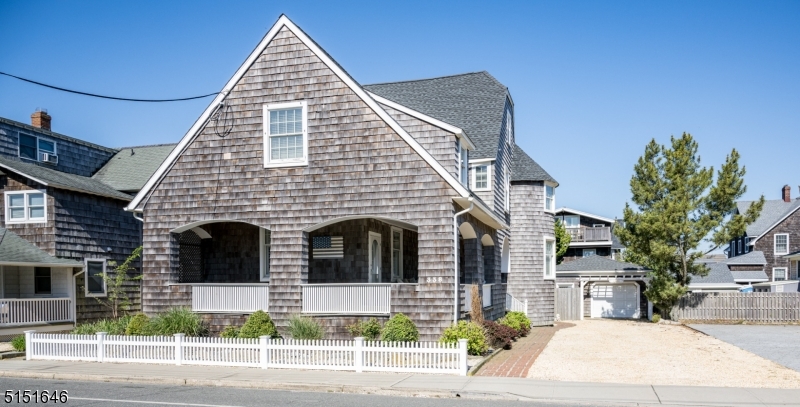 Don't miss a rare opportunity to own this classic Bay Head beauty with 6 bedrooms and 3 1/2 baths in a town rich in history. Located on the desirable north-end of prestigious East Avenue, just steps from the beach. Enjoy the charm and warmth of this late nineteenth century home with modern amenities and old-world detailing. Wonderful main-floor living areas are complemented by a spectacular wrap around porch, perhaps the best porch on East Ave! Host friends and family in the modern kitchen boasting a Wolf stove, and Subzero refrigerator. Plenty of room for your guests to park in the large driveway. Memories waiting to be made!