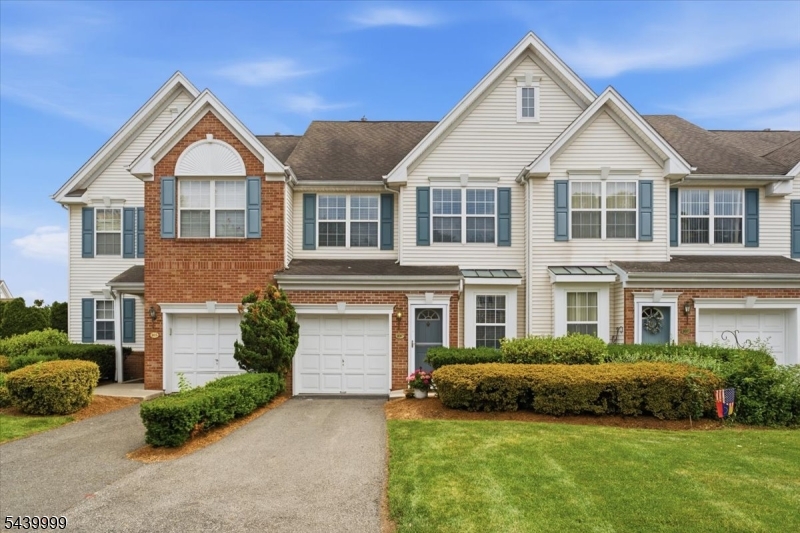 Welcome to this beautifully updated Buckingham model in the highly sought-after Cambridge Heights community in Nutley.This move-in ready home offers a thoughtfully designed first floor with an inviting and functional layout. Enter through the tiled foyer into the dedicated dining area, offering ample space for a dining table and buffet?perfect for family dinners and entertaining. The dining space flows naturally into the spacious living room featuring a cozy gas fireplace and an open, welcoming atmosphere. Adjacent to the living area, the kitchen is separated by a center island. Kitchen features butcher block countertops, classic subway tile backsplash, farmhouse sink, stainless steel appliances, and direct access through sliding glass doors to the private outdoor patio?creating an ideal indoor-outdoor living experience.Upstairs, the second floor offers two generously sized bedrooms, two fully renovated bathrooms, and a versatile family room complete with a closet?ideal as a media room, home office, or guest space. A spacious laundry room with abundant shelving provides exceptional storage and everyday convenience.