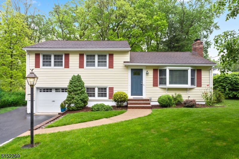 Open the door and be prepared to feel welcomed. It's all here and perfect! Fabulous 3 Bedroom & 1 1/2 bath home in the Whippany section of Hanover Township.  Highly desirable Hanover Township is known for its low taxes & excellent schools.  Freshly painted with refinished HW floors in the living room & dining room. Kitchen opens to the dining room with plenty of counters, cabinets and breakfast bar.  Spacious living room with shiplap feature wall with wood burning fireplace. The second level has a Master bedroom with two additional bedrooms. Hallway full bathroom was recently updated with marble countertop vanity, subway tiles in shower and a beautiful tiled floor. New carpet in the hallway.  The ground level has a good sized family room, updated half bath and laundry area. New front door & new steps. Oversized garage with plenty of room for car & storage. Private backyard with patio. Township has a beautiful town pool (additional fee), community center, before/after school programs, numerous sports programs and much more. Several parks throughout Hanover Township. Convent train station with NYC Midtown Direct train. Short ride into downtown Morristown with restaurants, shops & theatre. Convenient location with easy access to major highways.