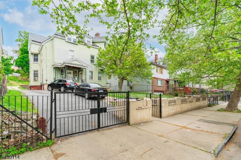 Income-producing commercial boarding house located in the Northern section of Newark. This property features 15 rentable units, offering strong cash flow potential for investors. All tenancies are currently month-to-month, providing flexibility for repositioning or future rent adjustments. Rent roll and income/expense details available upon request. Property is being sold strictly AS-IS. Buyer is responsible for all municipal inspections, certifications, and any required repairs. Conveniently located near major transportation routes, public transit, shopping, and local amenities, with easy access to highways and nearby business districts. Excellent opportunity for investors seeking a value-add or income-generating asset in a high-demand rental market.