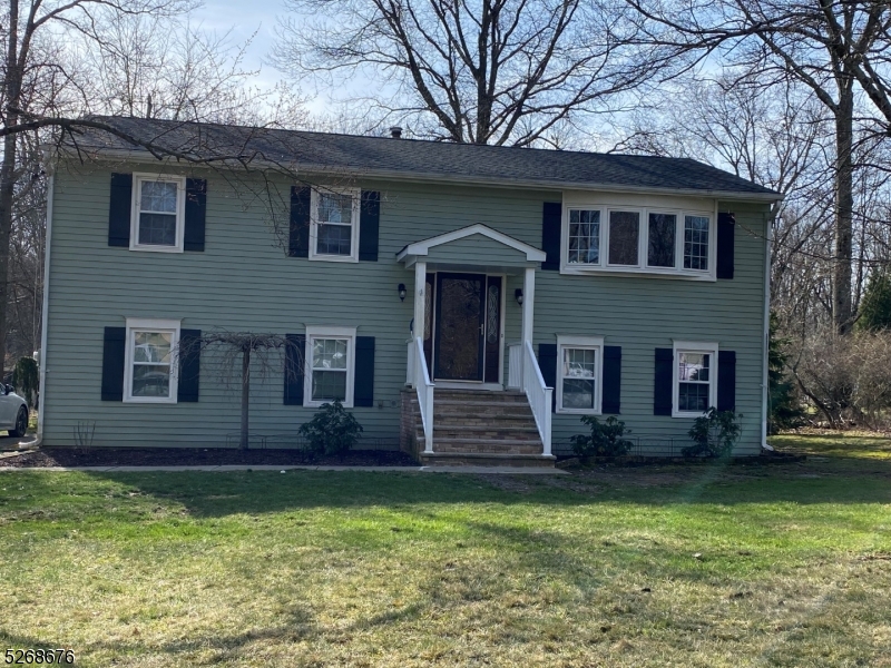 Lovely updated bilevel in Fawnridge neighborhood with public water, sewer and natural gas!  Level and open lot, 2 car garage, updated bath and powder room, hardwood floors throughout the main level, lower level features newer vinyl plank flooring, shiplap walls and updated interior doors.  French door from lower level to rear yard.  Roof redone in 2016.  Neighborhood mininal HOA fee for Fawnridge park, with playground, basketball and ice rink in winter.  Long Valley Schools and West Morris Central High School with IB Program.  Minutes to Rt. 80.