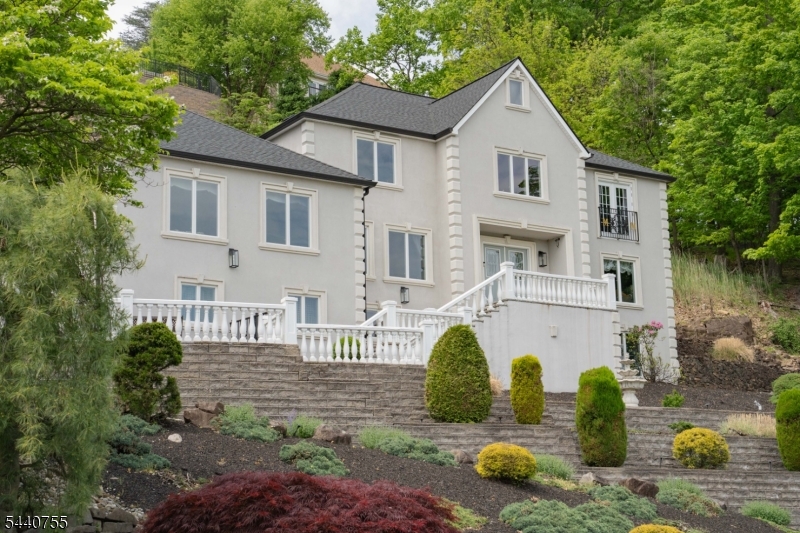Gorgeous custom-built Colonial located at the end of a private cul-de-sac in Cedar Grove's highly sought-after Park Ridge Estate section. Situated on a sprawling 20,973 SF lot, this exceptional home offers approximately 4,500 SF of living space featuring 10 rooms, 5 bedrooms, 3.5 bathrooms and a finished basement.Enjoy breathtaking views, outstanding privacy and a flexible floor plan ideal for both everyday living and entertaining. Additional features include central air conditioning, gas baseboard heat, a new roof and a spacious 3-car garage. The expansive property offers endless possibilities for outdoor living, recreation, and future enhancements.A rare opportunity to own a move-in ready luxury home in one of Cedar Grove's most desirable neighborhoods.