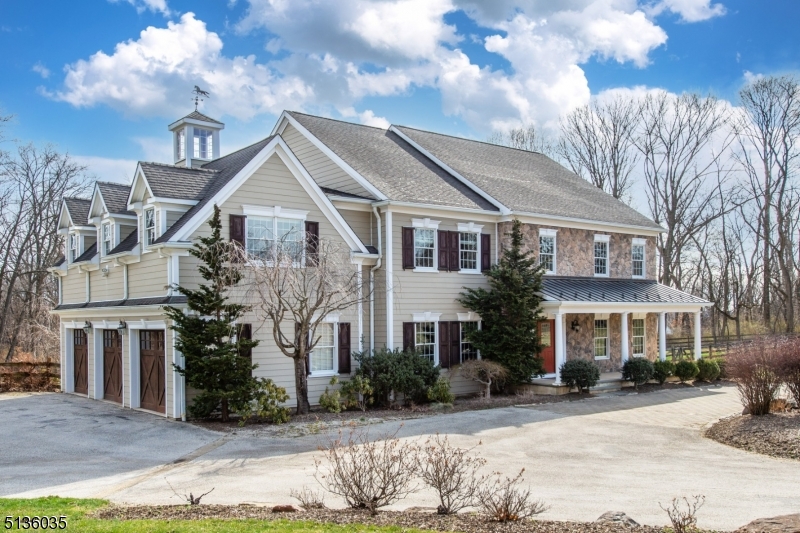 "Enjoy the serenity of this private, grand, custom built colonial home on 4.7+ acres in gorgeous Chester, NJ.   A long stately driveway leads you to a beautifully designed dream home with deer fencing surrounding the entire property.Open two story foyer allows for loads of natural sunlight and a finished basement with high ceilings adds extra living space.A large master bedroom with a sitting room en-suite is one of the spacious five bedrooms this home has to offer.Eat-in kitchen with thermal sliders leads out to an open deck, great for entertaining. Finished basement with high ceilings, 3-zone heating, and craftsman style moldings throughout the home.Quiet flag lot with home set well back from main street.  Hot tub outside with solid concrete foundation and walk-way to/from home.Built-in full house generator, sump pump in the basement, full water treatment.  1k sq. feet total storage space including large 3-car garage and three large storage closets in the basement.   Attic w/ easy access via pull-down stairs."