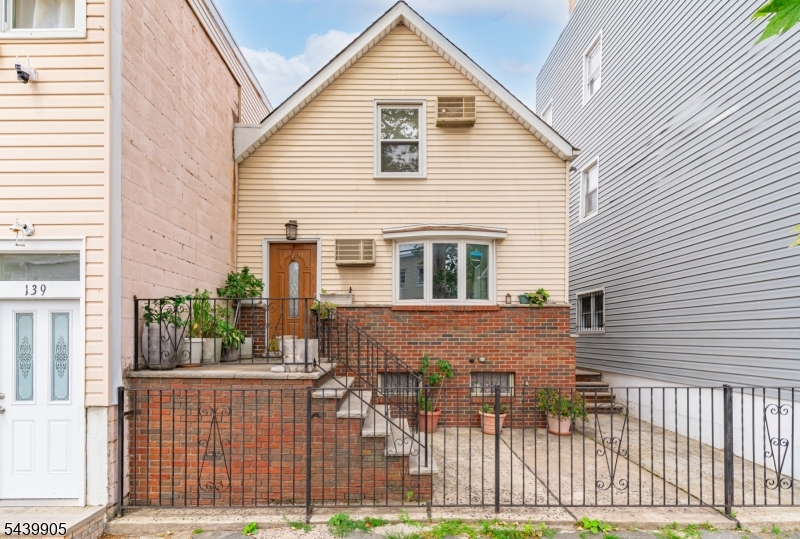 Welcome to 141 Walnut Street, a charming single-family home ideally located in Newark's desirable Ironbound neighborhood.  This well maintained residence features 3 bedrooms and 1.5 bathrooms, offering a functional layout with plenty of living space. The first floor includes a spacious living room, formal dining room, large eat in kitchen, full bathroom and a convenient first floor bedroom.  Upstairs, you'll find two additional bedrooms and half bath.  The full basement provides ample storage space and includes a laundry area.Situated in a prime location close to shopping, restaurants, parks, major highways, public transportation and Newark Penn Station, this home offers both comfort and convenience. Whether you're a first time homebuyer or looking to downsize, this property presents an excellent opportunity to own in one of Newark's most sought-after neighborhoods.