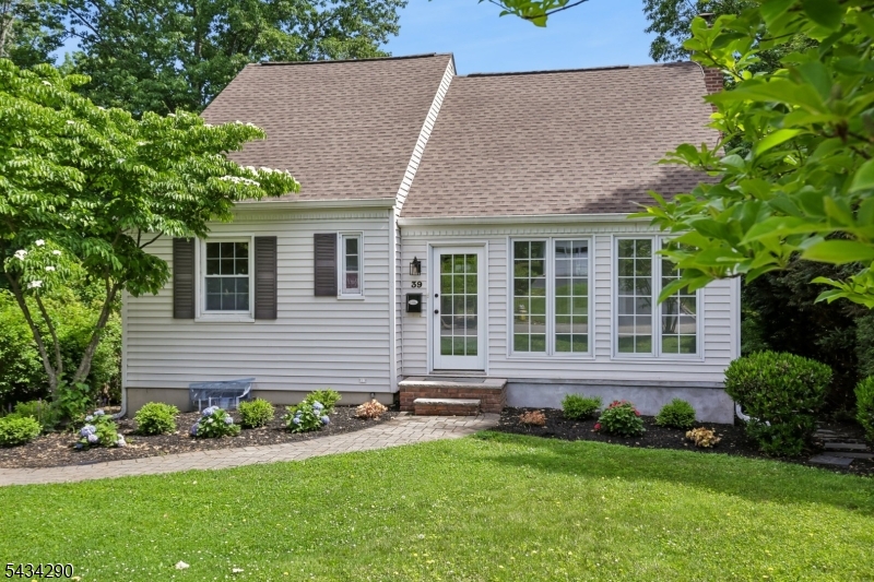 Set on a quiet street in a sought after neighborhood, this charming renovated Cape seamlessly blends timeless character with today's modern comforts.  Filled with warmth and natural light this inviting home offers an ideal floor plan with four bedrooms and two beautifully updated full baths, perfect for comfortable everyday living.  The welcoming family room anchored by a cozy gas fireplace creates the perfect setting for gathering and relaxing.  An inviting front room offers wonderful flexibility as a den, office or sun filled sunroom. The eat in kitchen, the heart of the home, offers a warm and functional space for casual dining and entertaining.  A first floor bedroom paired with a newly renovated full bath provides convenience and versatility for guests, a home office or first floor living.  Upstairs three bedroom and another full bath offer comfort and privacy for all.  The finished renovated lower level expands living space with a recreation room ideal for movie nights, play space or gym along with a dedicated laundry room and ample storage.  Outside enjoy peaceful mornings or summer gatherings on the expansive deck overlooking the yard.  Perfectly located just moments from the Convent Station train, major highways, shopping, restaurants and top rated schools, this special home offers the perfect combination of charm, convenience,and lifestyle.  A truly wonderful opportunity to enjoy easy living in a location that feels like home the moment you arrive.