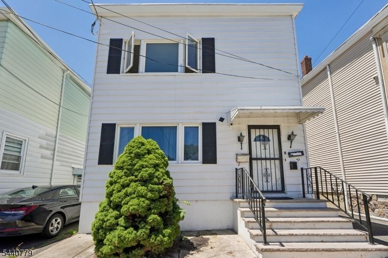 Welcome to 31 Blakely Place in Garfield, NJ. A rare opportunity for both investors and owners-occupants looking to maximize value in a highly desirable community. This legal Two-Family home features are finished basement and a finished attic that is connected to the second-floor unit, offering flexible living space to accommodate a variety of needs. Whether you're looking to live in one unit while offsetting expenses with rental income or expand your real estate portfolio, this property offers incredible potential and versatility. Located in on of Bergen County's most sought -after towns, you'll enjoy convenient access to shopping, dinning, schools, parks and major transportation routes. Don't miss this exceptional opportunity to own an income-producing property to own an income-producing property  with additional  finish living space and endless possibilities in the heart of Garfield.
