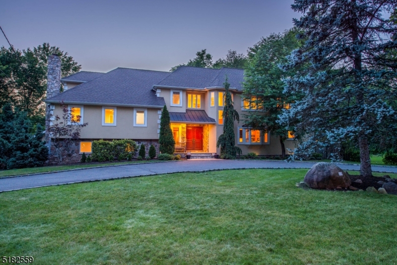 PRESTIGE of COVENTRY and GRANDNESS of EUROPEAN style 5 Bedroom + 5  Bath COLONIAL w/over 5000 Sq Ft of Living Space.  Beautiful RESORT GROUNDS incl Completely Renovated HEATED POOL . Be Wowed by TRULY GRAND FOYER! ENOURMOUS 550sq ft ALL CUSTOM Kitchen with SEATING for 20. Enjoy VIEWS of the PATIO & POOL thru French Doors and Sliders from FORMAL Dining, Living and Family Rooms. GREAT ROOM with ARCHITECTURAL CEILINGS offer more Backyard Views. Cozy MASTER SUITE features Oversized JETTED TUB, BIDET, walk-in Outfitted Closet and TRAY CEILING + Stunning BARNEY like Walk in FULLY OUTFITTED Closet off Master Suite.   Exceptional Features: CATWALK overlooking 2-Story FOYER, 1 GAS + 1 Wood Burning FIREPLACES, Italian PORCELAIN Bathrooms, HARDWOOD floors throughout. GRAND and BACK STAIRCASES.  Close proximity to all that Livingston has to offer! MOVE RIGHT IN & ENJOY LIFE!