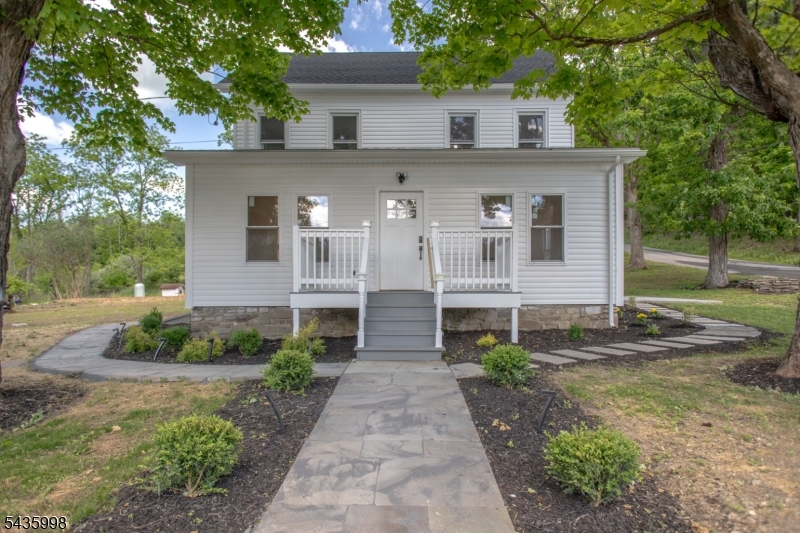 Welcome to 91 Gemmer Rd, a beautifully renovated Colonial where classic charm meets modern living. Completely remodeled from top to bottom, this move-in-ready home offers 4 bedrooms, 2 full baths, and stylish finishes throughout. Step inside to a bright, open-concept floor plan filled with natural light and enhanced by recessed lighting. The stunning kitchen features custom cabinetry, quartz countertops, stainless steel appliances, a designer backsplash, and a spacious breakfast bar perfect for entertaining and everyday living. The inviting living room with electric fireplace flows seamlessly into the dining area, creating an ideal space for gatherings. A convenient mudroom adds everyday functionality. Both bathrooms have been thoughtfully updated with elegant tilework, floating vanities, and contemporary fixtures. Four generously sized bedrooms provide comfortable living space, while the fully finished basement offers endless possibilities for a recreation room, home office, gym, or media room. Outside, enjoy professionally landscaped grounds, bluestone walkways, and a private patio designed for relaxing and entertaining. Conveniently located near shopping, dining, parks, schools, and major commuting routes, this exceptional home offers comfort, style, and convenience. Come see what life could look like at 91 Gemmer Rd where there's space to breathe, room to grow, and a place to truly feel at home.