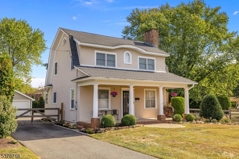 Welcome to this charming and beautifully maintained home that combines modern comfort with timeless character! Step onto the inviting covered rocking chair front porch, the perfect spot to relax with your morning coffee or unwind in the evening. Inside, you'll find hardwood floors throughout and a warm and welcoming living room with a wood-burning fireplace framed in stunning field stone, a true focal point.  The heart of the home is the white kitchen, featuring stainless steel appliances and plenty of white cabinetry for storage and style. Step outside to enjoy your private level, fenced-in yard complete with a paver patio, fire pit, and plenty of space for play or entertaining.  Car lovers, hobbyists, or anyone in need of extra storage will love the 4-car detached garage, fully heated, insulated, and equipped with a workshop ideal for year-round use. Additional highlights include a generator hookup, central air conditioning, 3-zone baseboard hot water heat, public water and sewer, and a new roof installed in 2022 for peace of mind. Completely move-in ready, 2 blocks to Horseshoe Lake, minutes to major highways, shopping and dining.  Excellent Roxbury Schools!