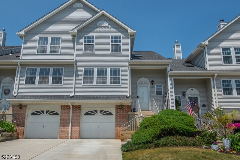 Check out this beautiful 2 bedroom 1.5 bath townhome in Oak Hill. Unit is freshly painted and is complete with granite countertops, laminate flooring throughout, central air, wood burning fireplace, sliders to personal deck, whole house humidifier, 1 car garage and more! Enjoy communal tennis courts, basketball courts and playground. Great location, close to route 80 and plenty of shopping, restaurants and entertainment.