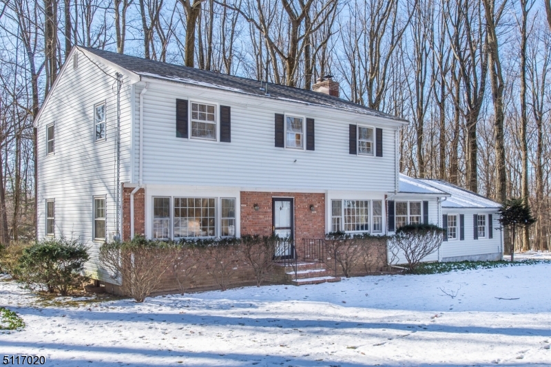 Classic center hall colonial in fantastic Powder Mill offers the new owners much potential!  Spacious rooms, 3 year old roof, vinyl siding, public water and sewer, partially finished basement with heat and workshop, family room with wood burning stove.  Living room and dining room have oak flooring, four large bedrooms on 2nd level with oak flooring and generous sized closets, pull down stairs to partially floored attic for storage.  Lovely, shaded level lot with patio and low maintenance landscape.  Minutes to Routes 10, 287 and 80.