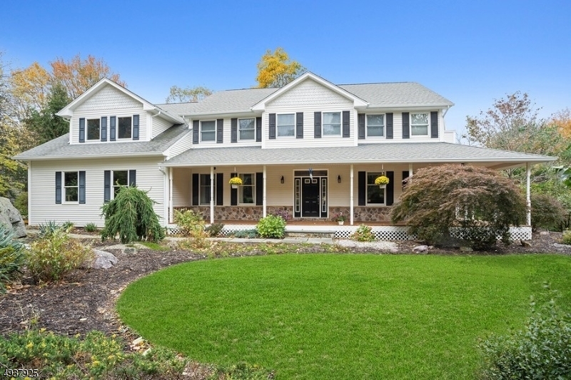Gracious 2000 built custom CHC with 4 bd, 4 bth. Lovely cedar porch greets you among mature landscaping and large flat back yard.Formal living and dining room with hardwood floors. Spacious family room with floor to ceiling rock fireplace. Kitchen with windows that overlook the backyard. Custom cabinets and granite counters, SS appliances and a separate eating area. There is a full bath, office/guest room and laundry room on this level.Upstairs are 3 bds, 3bth. Master with  full bath, plus his and hers vanities. Home has city water, 4 zone heat, cooling and 3 car garage. Multi HOME OFFICE flex spaces!