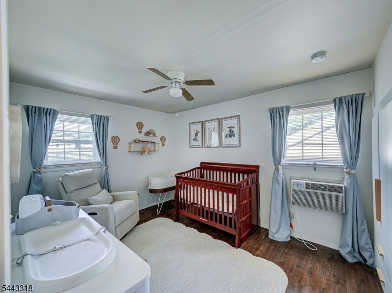 Welcome Home to this beautiful 4-bedroom, 2-bathroom home featuring thoughtful updates throughout. The bright and sunny living room flows seamlessly into the dining area, highlighted by stylish light fixtures that add warmth and elegance. The home offers four generously sized bedrooms, two full bathrooms, a partial basement. Step outside to your own private retreat featuring a stunning, partially fenced backyard and a beautiful screened-in porch perfect for enjoying or entertaining. Ideally located in a great commuter location, this home is within walking distance to the train with direct service to New York City, as well as restaurants, shops, parks, and many other everyday conveniences. Enjoy the perfect combination of privacy, comfort, and accessibility. Don't miss the opportunity to make this exceptional home yours!