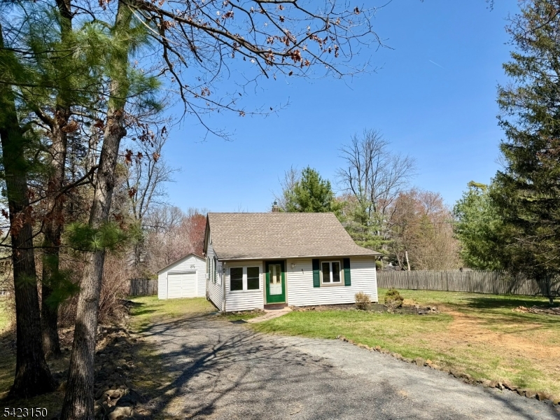 Tucked away in the sought-after Martinsville (Bridgewater), this home offers peaceful living/exciting future potential.  Set on a no-through Lane.  Serene setting directly across from open parkland, beautiful views, privacy and a relaxing atmosphere.  Sunlight fills the home, enhancing it's inviting open layout, offering functionality and comfort.  Includes: Attic storage space, 1-car garage.  System updates include boiler, water heater, sump pump (2020's).  New 300 ft. private well March 2026 with water treatment system.  Highly desirable Bridgewater-Raritan schools.  Just minutes to major highways, commuting options, shopping, dining and recreational amenities.  Prime location with potential for future growth/customization.  Rare opportunity to create your ideal living space in one of the area's most desirable neighborhoods.