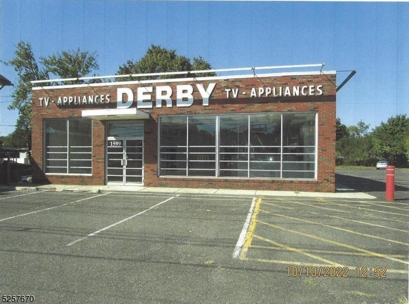 Retail space suitable for food use as-is condition. Parking is suitable for 26 cars. Alarm system electric overhead garage door and storage shelves in the garage area.