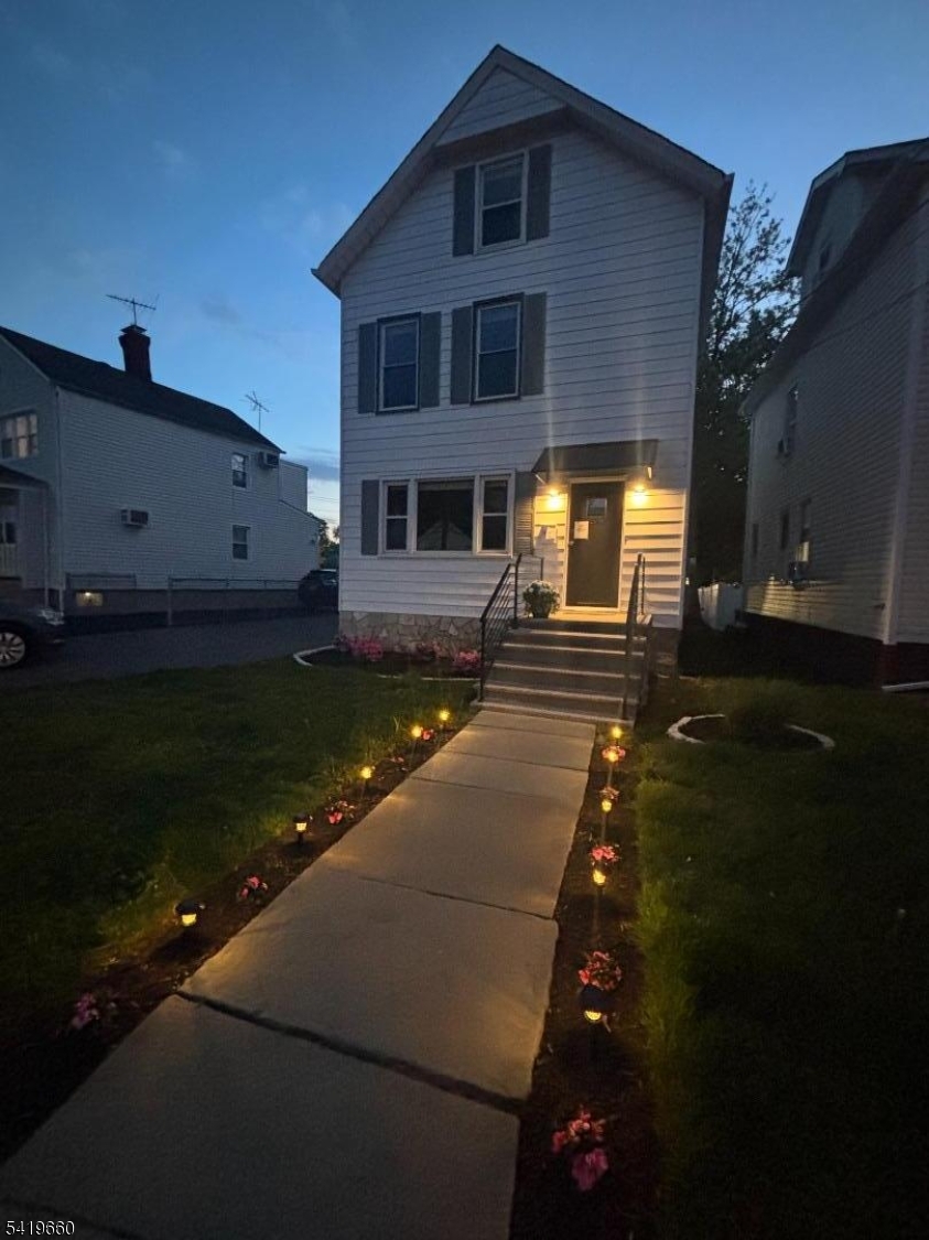 Turn-of-the-century charm meets modern flair in this renovated 4 bed/2.5 bath Colonial that's literally a 3 minute walk to downtown Bloomfield mid-town direct/ Hoboken trains, shopping and restaurants! Feast your senses as you step onto the newly designed front stoop w/ sleek modern handrails and awning, new landscaping & lights. The 1st floor has bright sunny windows, original ribbon-inlay HW floors, tall ceilings and modern updates throughout. New lighting in the entry hall, LR, DR, K (all new appliances!) PR, and Laundry Room. Head upstairs to the 2nd floor where you'll find a newly updated main hall bath w/ penny tile and floating vanity. 3 well-proportioned BRs and large handy hall WIC complete the picture. The 3rd floor features office/rec area w/ vaulted ceilings, full bath and spacious 4th BR. Freshly painted basement has great space for extra storage. A beautiful (and tranquil) deck off the back allows for morning coffee (or dining al fresco!), a 3/4 fenced yard, and off-street parking for 2 cars. Stroll down to Anthony's Cheesecake, Wings n Burger, or Bloomfield Steak & Seafood and Hometown Arcade for summer dining and fun! Don't miss this one!!