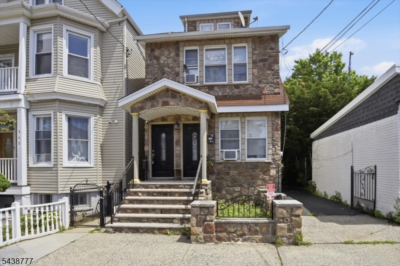 Prime multi-unit investment opportunity in a highly walkable Kearny location. Well-maintained 2-unit property features a versatile layout with Unit 1 occupying the first floor and Unit 2 spanning the second and third floors, ideal for investors or owner-occupants seeking rental income.Unit 1 offers a comfortable 1-bedroom, 1-bath layout with a bright living room, eat-in kitchen, and full bath. Unit 2 provides expansive space across two levels and features 3 bedrooms, 2 full baths, a spacious living area, dining space, and updated kitchen with rich wood cabinetry and ample storage. Hardwood flooring throughout much of the home alongside tiled bathroom floors and walls.Property's attractive stone fa ade and covered front porch provide excellent curb appeal. Additional features include a shared basement with washer and dryer, a long driveway, fenced backyard, and detached 2-car garage with one dedicated garage spot for each unit. Outdoor space offers room for recreation, entertaining, and additional storage.Conveniently located near shopping, dining, parks, schools, and major highways, this property boasts a Walk Score of 89, providing easy access to everyday amenities, public transportation, and nearby bike infrastructure. Whether you're looking to add to your investment portfolio or live in one unit while generating income from the other, this multifamily property presents an outstanding opportunity in one of Kearny's most commuter-friendly locations.