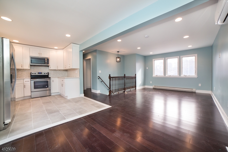 Beautiful renovated 3 Bedroom, 1 Full Bath & 1 Half Bath Bi-Level, featuring brand new siding, hardwood floors, stainless-steel appliances, highly efficient heating/cooling. All you have to do is move right in!