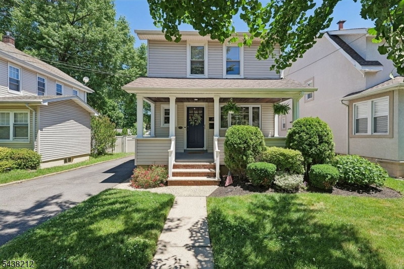 Just a stone's throw from Memorial Park, this renovated 3 bedroom side-hall Colonial combines timeless charm with today's modern conveniences. A welcoming open front porch greets you upon arrival, offering the perfect spot to enjoy your morning coffee or unwind at the end of the day. Inside, the open-concept layout creates an effortless flow between the living and dining areas, ideal for both everyday living and entertaining. The beautifully updated kitchen serves as the heart of the home, featuring a center island, stunning quartz countertops, and ample space for gathering. Upstairs, three comfortable bedrooms provide peaceful retreats, while the finished basement offers valuable bonus space perfect for a home office, gym, or playroom. Step outside to a fully fenced backyard complete with a new concrete patio, creating a private outdoor oasis for dining, relaxing, and entertaining all season long. Conveniently located on a charming tree-lined street near parks, Starbucks, transportation and dining, this move-in-ready home offers the perfect blend of character, functionality, and location in one of Nutley's most desirable neighborhoods.