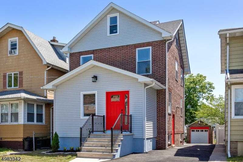 WOW!! FULLY RENOVATED W/ A FULL MASTER SUITE, FULLY FINISHED BASEMENT. EVERYTHING NEW! Hardwood floors throughout. BRAND NEW KITCHEN! Open Layout! Absolutely GORGEOUS! CLOSE TO NYC TRANSIT Upon entering, you are welcomed with a vaulted ceiling foyer, hardwood floors, & abundant light coming from BRAND NEW WINDOWS. Large living room area is the perfect hangout, and open to the beautiful dining room with crystal chandelier. The Chefs kitchen is PERFECT for holiday cooking. Large guest bedrooms with full bath, and you will FALL IN LOVE with the master suite, complete with marble tile spa bath. The finished basement add additional entertaining space. Back yard is perfect for BBQs. Enjoy a turn key home with nothing to do but move in. NEW WINDOWS, NEW ROOF, NEW HVAC, NEW HEAT & MORE