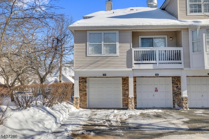 Rare first floor unit with no stairs and direct access from private garage. 1 generous sized primary bedroom and large den could be used as 2nd bedroom or office. Light and bright, updated, freshly painted and move-in ready, this end unit condo in Willow Walk is perfect for first time buyers and down-sizers needing one floor living! Convenient to everything - highways, shopping, dining, commuting.  Features include granite and stainless kitchen, washer/dryer/fridge included, HVAC 1 year old, custom blinds, new garage door, pendant and recessed lighting, in-unit laundry room/mud room, balcony style deck and so much more!  Home sold as-is with no known defects, furniture and belongings will remain.