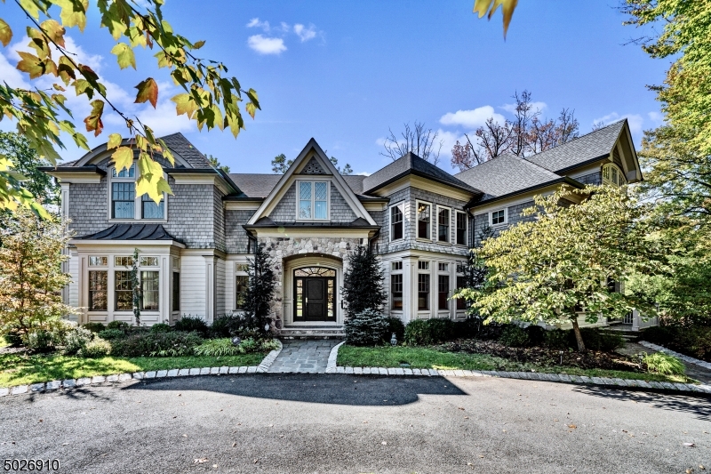 Welcome home to tasteful elegance in this 8,098 sqf 7BD/6.5BA retreat on .62 acres. This mansion lets you work, live and play in pure luxury. The chef's kitchen offers S.S. Sub-zero, Wolf and Miele high-end appliances. Features 1st floor office and in-law suite with WIC. Huge master en-suite has tray ceilings, seating area with gas fireplace, oversized WIC, double showers, marble tile, and a jet soak tub. Oversized closets and large windows in all bedrooms. The gorgeous lower level features recreation space, including a bedroom suite with full bath & WIC, an elevated mud room which leads to the 3 car garage. Backyard includes stunning outdoor pool, spa, and patio. Mid-town direct train line, high-ranking Short Hills school pyramid, shopping, hiking and golf. Book your private viewing today!