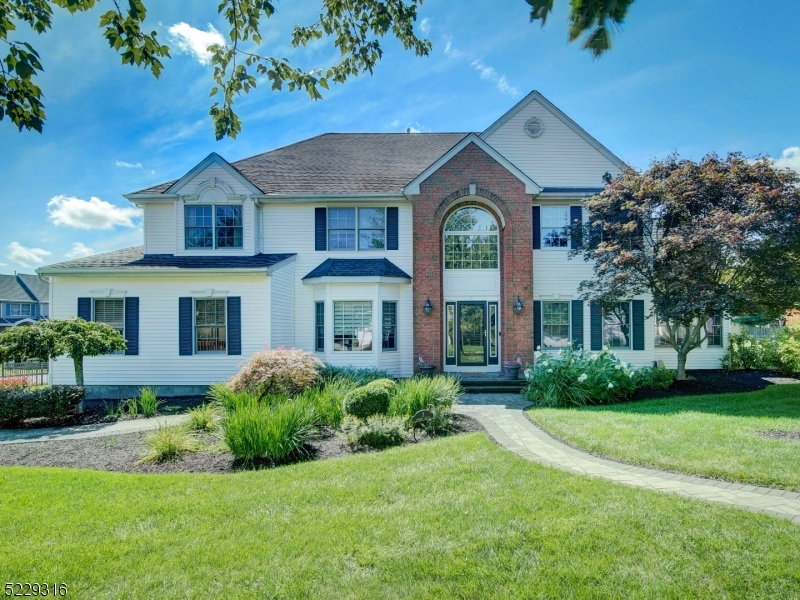 Presenting this stunning home of unparalleled elegance that is masterfully designed & will impress all. It is located on a corner, fenced & tree lined lot w plentiful yard space. Enter grand 2 story foyer & appreciate all the attention to detail thru/o this pristine home. Custom, designer kitchen has all the must haves including sleek cabinetry, quartz c-tops, high end appliances, pantry, wine fridge, coffered ceilings & Restoration Hardware fixtures & trim. Adjacent to the kitchen is a mudroom/laundry area complete w built ins for convenience & family rm w wood burning fireplace. First floor home office is a plus & has new carpet. Large formal dining room, full bath, elegant light & bright conservatory & unique Media/ Multi sport Simulation Room set up for golf lovers w included projector/ projection screen w impact padding & hideaway drapes & can transform to its original living rm design. Owner's en suite is an exceptional retreat featuring tray ceiling, 2 ex-large walk-ins w custom closet systems, luxurious renovated bath w heated flrs, huge walk-in shower, custom vanity & high end lighting & fixtures. 3 add'l spacious bdrms & full bath complete 2nd level. Fin bsmt incl office w built in work space & home network rack, rec rm, kitchen, gas fp, half bath, exercise rm & utility/storage rm. More highlights: Trex deck, paver walkway, wood floors, moldings, high end lighting, new carpet in 2 bdrms, storage shed, professional landscaping & u/g irrigation system.