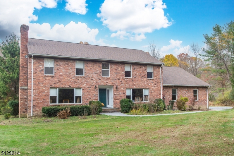 Welcome to this Custom Center Hall Colonial on 6+ acres in the town of Frelinghuysen. Enter into the entry foyer which immediately draws your attention to the 8x20' hallway leading to the Great Room! The GR has Cathedral Ceilings, a stunning Vermont Casting Wood Stove & has tons of natural light from the Skylights & French Doors to the deck. The 1st FL also includes a Formal DR, LR w/ an Amish Fieldstone Fireplace, Study, Powder Room & the Kitchen! The Kitchen features Oak cabinets, Butcher Block countertops, a Pantry, Kitchen Aid Appliances & Sliders to the deck! The 2nd floor has 4 large BRs, including the Master Suite. The Master boasts a dressing area, WIC & Master Bath w/ a stall shower & soaking tub. The home is complete with a full basement, central vac, 3 car garage, newer roof, new oil tanks & more!