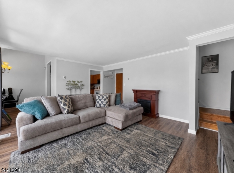 Welcome to this well-maintained 2-bedroom, 1-bath condo featuring a bright and functional layout filled with natural light. The spacious living and dining areas offer an open, inviting feel, while large windows throughout enhance gorgeous natural light. Enjoy the added benefit of a private deck, perfect for outdoor relaxation and washer and drier included in the unit. Commuters will appreciate the convenience of a bus with direct access to New York City. Conveniently located near shopping, dining, transportation, and major highways, this turn-key condo presents an excellent opportunity for homeowners and investors alike.