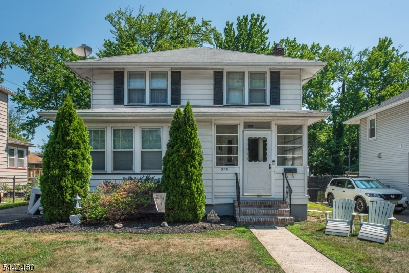 Stately and full of character, this 3-bedroom, 1-bath Colonial sits on an oversized lot just moments from Rahway River Park. Rich in classic charm, the first floor welcomes you with an enclosed front porch, a spacious living room showcasing beautiful original woodwork, a formal dining room, a functional kitchen, and a versatile den that is perfect for a home office, playroom, or additional living space.The second floor offers three generously sized bedrooms and a full bath, providing comfortable accommodations for a variety of lifestyles. Outside, the expansive property offers plenty of room for gardening, recreation, or future possibilities, while the detached two-car garage provides ample storage and parking.Situated on a quiet street, this home combines neighborhood tranquility with exceptional convenience. Enjoy easy access to major highways, schools, shopping, and all that downtown Rahway has to offer, including Midtown Direct train service to New York City, two performing arts centers, a local microbrewery, restaurants, cafes, and a vibrant downtown scene. A rare opportunity to own a classic Colonial on an oversized lot in one of Rahway's most desirable locations.