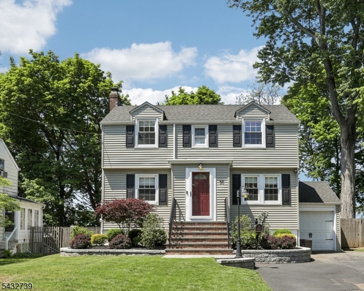 Nestled in the desirable Broadlawn section of Livingston, this charming 1930's Center Hall Colonial beautifully blends timeless character with thoughtful modern updates. Featuring 3 bedrooms and 1.5 newly renovated baths, this warm and inviting home offers hardwood floors throughout, a stunning new kitchen, and spacious living areas filled with natural light. The welcoming living room is centered around a gorgeous wood burning fireplace, creating the perfect space to gather and relax. A newly renovated basement provides additional flexible living space, while ample storage throughout the home adds everyday convenience. Additional highlights include a new central air conditioning system and a private backyard ideal for entertaining or quiet enjoyment. Conveniently located near shopping, dining, parks, and NYC transportation. Livingston Public Schools is highly regarded, consistently ranking among the top public school districts in New Jersey and among the top districts nationally. A wonderful opportunity to own a beautifully updated classic home in one of Livingston's most sought after neighborhoods.Final offers by Saturday, May 30th at 5pm