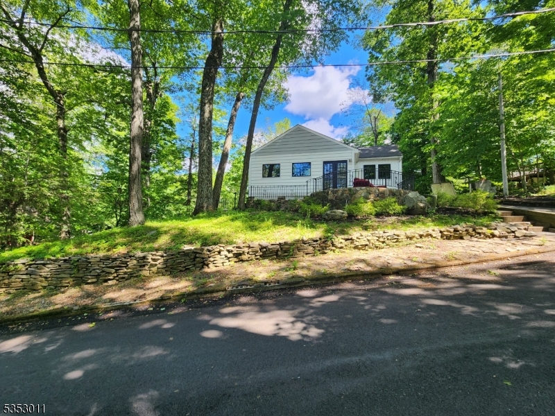 Cozy cottage on beautiful Raccoon Island, Lake Hopatcong.  Charming stone fireplace with large kitchen, 2 bedrooms, full bath, and porch room that could be used as a bedroom. DEEDED lake access via dock next to the ferry. Great views in a tranquil setting.  Island living at its best.  A short ferry ride to rest and relaxation. Get on New Jersey's largest lake before summer.  Ferry fee is $20 round trip. Ferry schedule is as follows:  April-Saturdays 8:30am-7pm and Sundays 8:30am-6pm. May-Fridays 5pm-10pm, Saturdays 8:30am-9pm, Sundays 8:30am-9pm. Summer schedule coming soon.