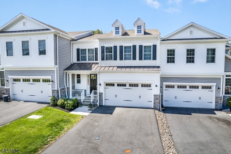 This beautiful well-appointed Enclave at Hillandale residence combines the convenience of luxury townhome living with the space, privacy, and comfort typically associated with a single family home.  An exceptional offering in one of Mendham Township's most sought-after communities.  Built in 2023, this exceptional Pratt II model offers approximately 4,000 sq ft of finished living space, a highly desirable first floor primary suite, and one of the most private settings at the end of a cul-de-sac.  Eight rooms comprising of 3 bedrooms including a coveted first floor primary bedroom; 2 additional bedrooms, comfortable sitting area, home office, and full bath on second floor including a roomy guest bedroom with walk-in closet; powder room; open floor plan living room with soaring 12' ceiling, handsome gas fireplace, and access to an inviting deck; tasteful dining area adjoins the living room; sensational chef's kitchen boasts gleaming quartz countertops, abundant wood cabinetry, pantry closet, premium stainless steel appliances, large center island with galley seating; service area has a convenient laundry room, mudroom area, & handy garage access; other notable features include abundant closet space, solid two-panel interior doors, specialty windows, & custom millwork--this townhome offers nearly 3,000 sq ft of living space on two main floors alone, plus a vast 1,000 sq ft finished lower level with walk-out to a cozy patio & fenced yard area, two-car attached garage