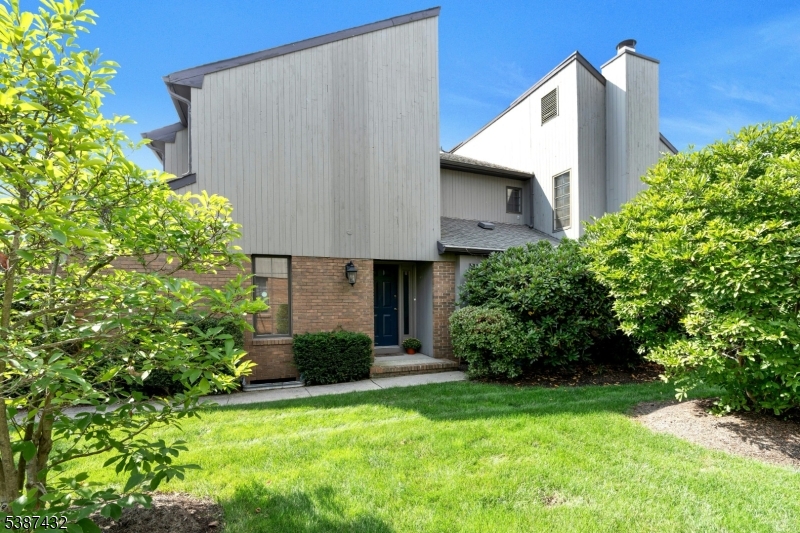 Warm, welcoming and full of natural sunlight this lovely end unit is located in the desirable Springbrook townhome community just minutes to downtown Morristown. Just 6 months ago the home was freshly painted and boasts many updates during that time in all 3 bathrooms and the kitchen, including new SS appliances to compliment the granite countertops previously installed and offers 2 generously sized pantries as well. The formal dining area flows seamlessly into the living room with a gas fireplace and full wall of glass sliders open to the patio and private grassy area beyond.  Rounding out the first floor is a den/office off the front hall adjacent to the updated powder room. The second floor features 3 spacious bedrooms including the primary suite with walk in closet, updated bath and vanity alcove, and a fabulous deck off the bedroom for taking in the surrounding beauty of nature! The 2 other large bedrooms are served by the updated hall bath with shower over tub. Hardwood flooring graces this entire level. The full basement offers great storage space and houses the utilities and the washer and dryer. Offering the benefits of the close proximity to vibrant Morristown, and easy access to highways and shopping, this home is a great choice! Available mid July.