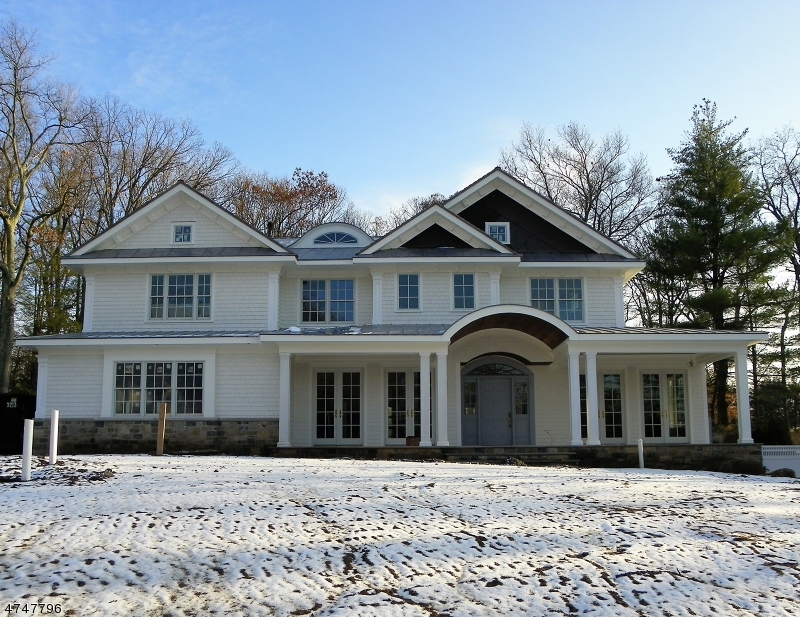 New Construction Custom Home by local well-regarded Short Hills builder. Stunning 7+ Bd, 6.5 Ba cedar & stone masterpiece on spectacular 2/3 ac lot in the Deerfield section. High ceilings, beautiful woodwork, striking Kitchen and Bathrooms, gorgeous Living Room with coffered ceiling, Family Room with beamed ceiling, fabulous front porch, large patio with outdoor fireplace, Master Bedroom suite with Sitting Rm with fireplace, 2 WICs and gorgeous Master Bath, 2nd floor Bedrooms each with en suite Baths, finished basement including Wine Cellar, Bedroom, full Bath, Media Room and Rec Room. Potential to add a Bedroom on the finished 3rd floor. 3-car attached heated garage and a large, level private yard.