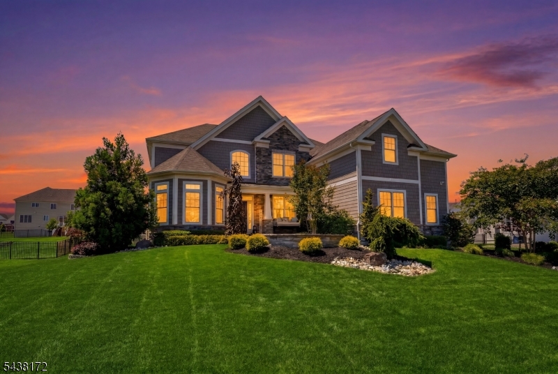 Welcome to 18 Waterford Way, a stunning six-year-young residence in the prestigious Estates at Bamm Hollow. Offering 4 bedrooms, 3 full bathrooms, and 2 half bathrooms, this beautifully appointed home combines modern luxury with exceptional craftsmanship.Designed for today's lifestyle, the expansive open-concept floor plan features sun-filled living spaces that flow seamlessly into a gourmet chef's kitchen complete with premium finishes, abundant cabinetry, and a large center island perfect for entertaining.An expansive deck extends the living space outdoors, creating the perfect setting for relaxation and gatherings. Located in one of Lincroft's most sought-after communities, this exceptional home offers the perfect blend of luxury, comfort, and convenience.